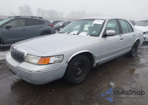 1999 Mercury Grand Marquis Gs из США, поврежденный, VIN 2MEFM74W2XX735580